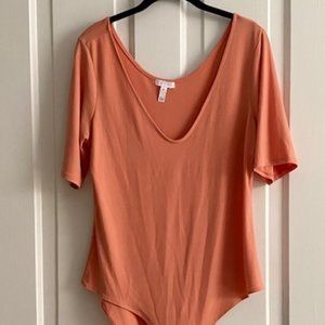 Cantaloupe colored body suit